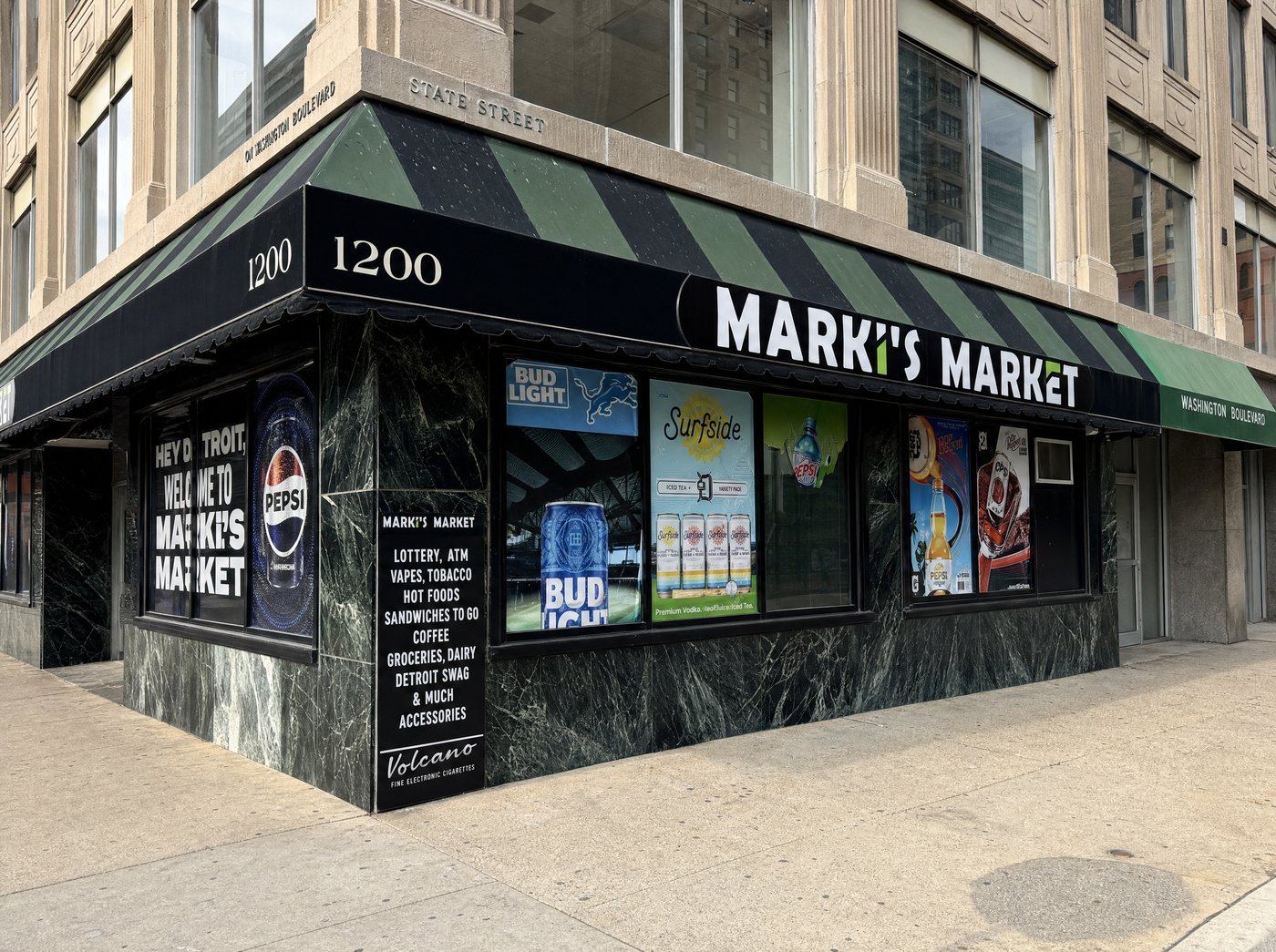 Washington Blvd storefront photo 3, address visible on awning